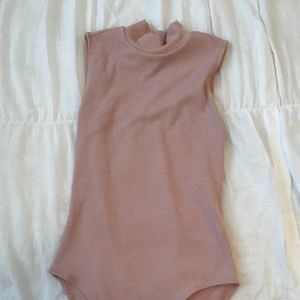 Light pink body suit